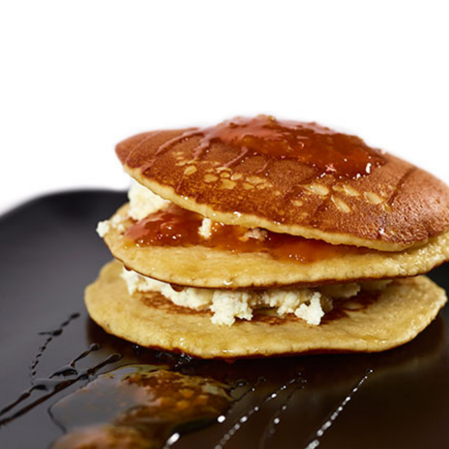 Panquecas com recheio de requeijão e doce de abóbora e topping de mel meia.dúzia