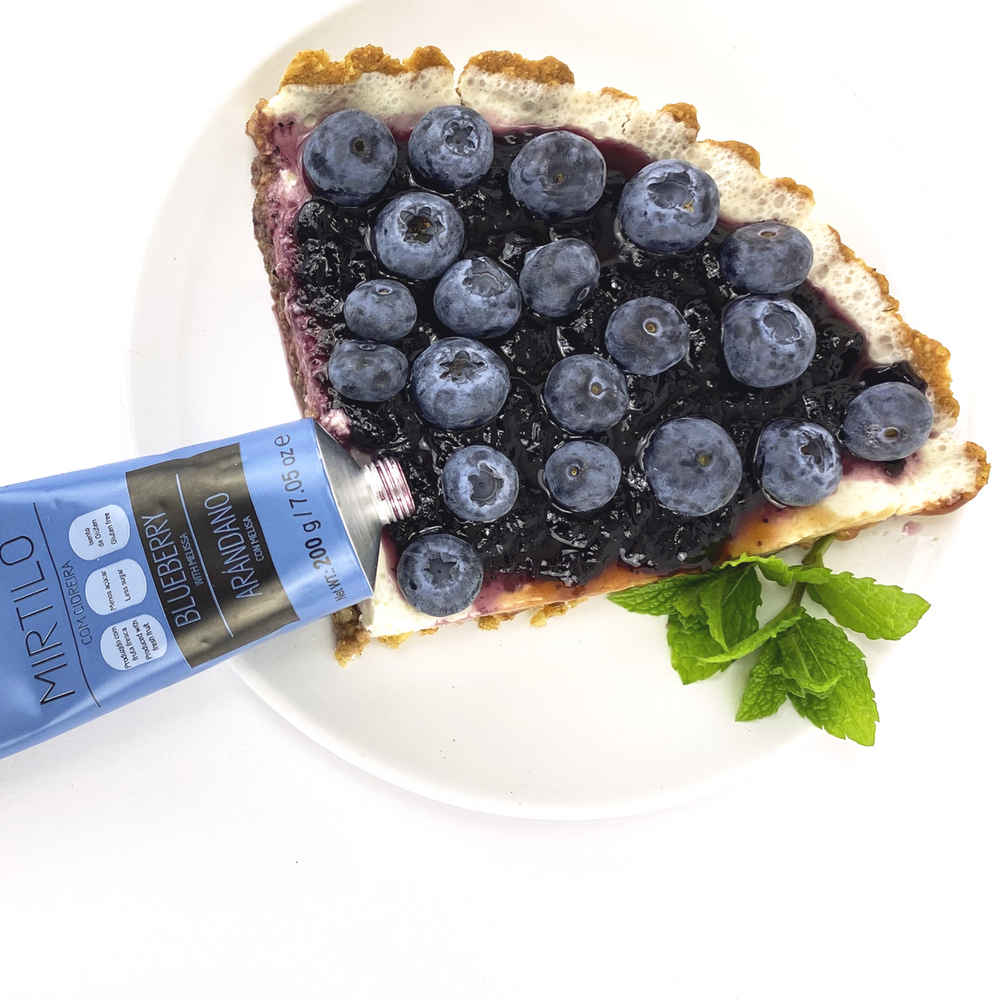 
                  
                    Cheesecake de frutos vermelhos com Doce Extra de Mirtilo com Cidreira - compota artesanal em bisnaga by meia.dúzia - sabores de Portugal
                  
                